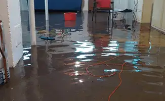 Basement with boiler, cabinets and washing machine completely flooded in Marietta, GA