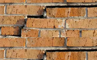 Brick wall with serious structural damage in Marietta, GA