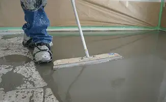 Uneven floor being professionally repaired in Marietta, GA